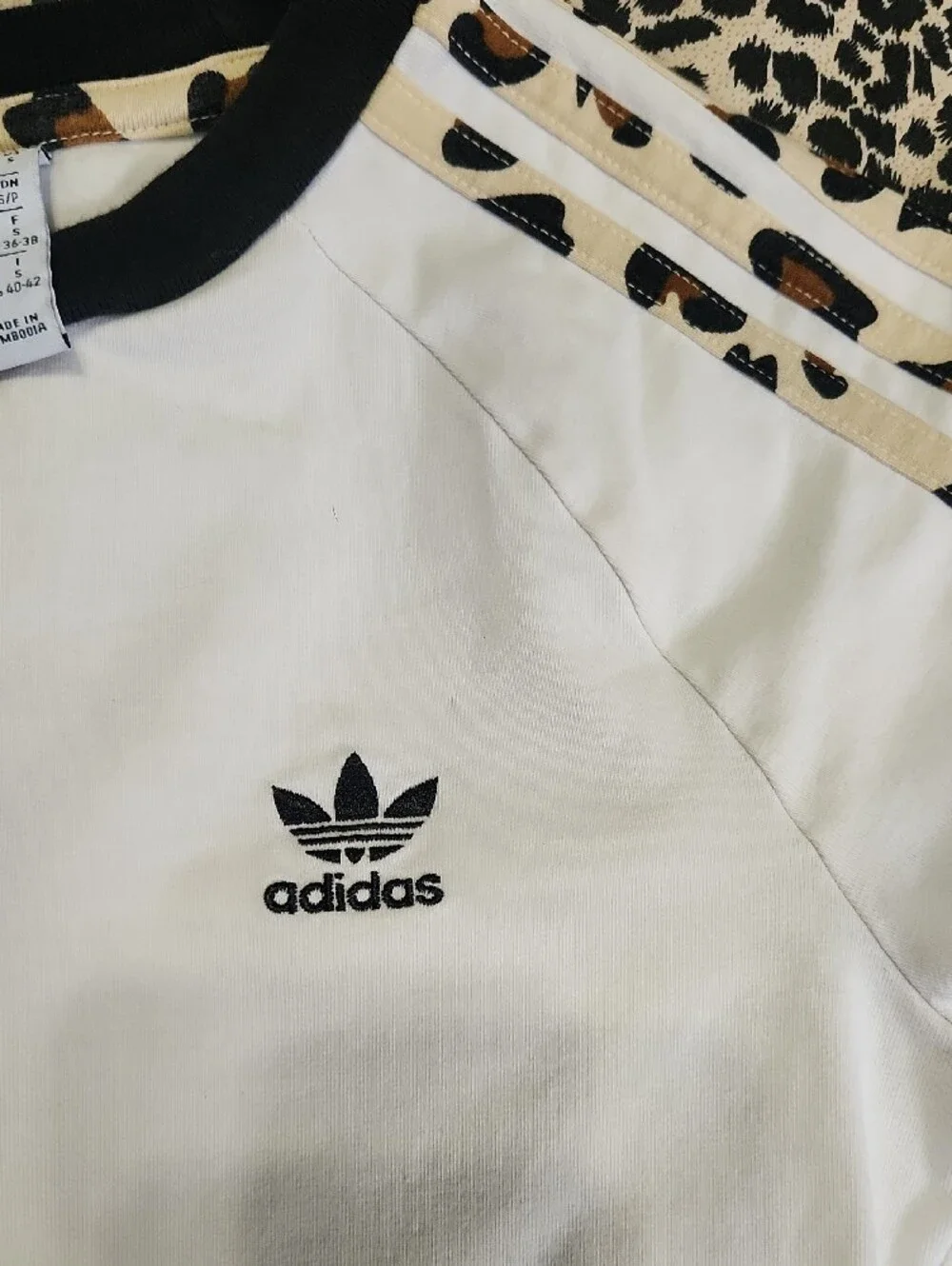 adidas White Short Sleeve Tee with Leopard Shoulder Stripes. Girl's Lg